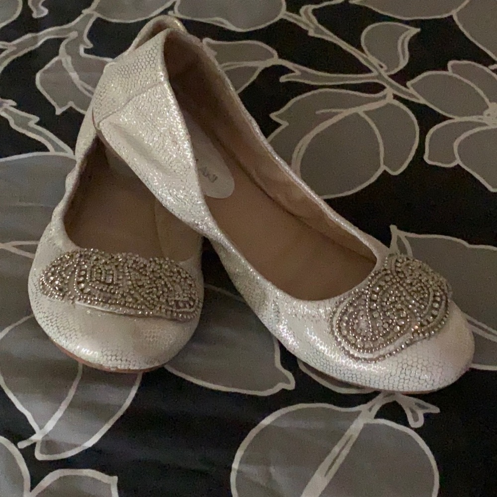 Antonio Melani white and silver flat.